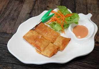 fried ham cheese roll on white dish