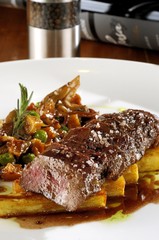 Roast lamb in red wine