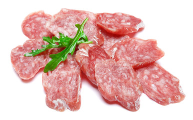Dried sliced organic salami sausage on white background