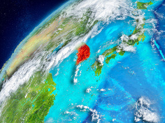Space view of South Korea in red