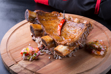 Grilled ribs served with rice