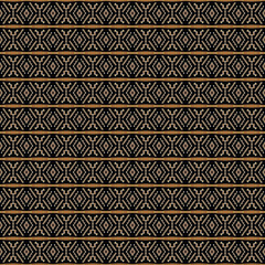 Ethnic pattern in the style of African tribes, Australians, American Indians. Seamless background for print on fabric