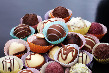 a lot of variety chocolate pralines, belgian confectionery gourmet chocolate.