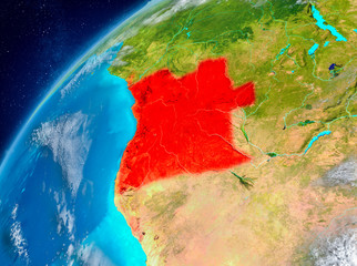 Space view of Angola in red