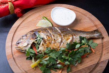Grilled dorada fish