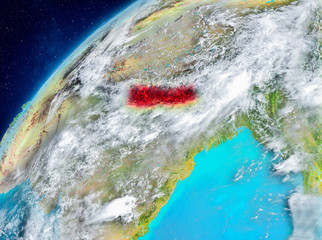Space view of Nepal in red