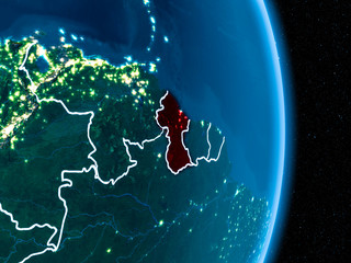 Guyana in red at night