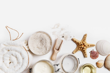 Spa theme objects on white paper background. Beauty threatment concept. Space for text. Flat lay.