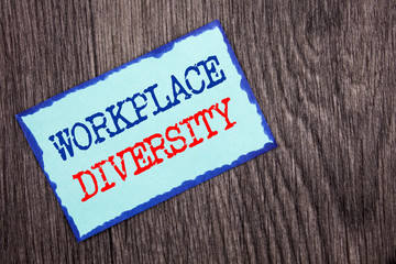 Writing text showing Workplace Diversity. Business photo showcasing Corporate Culture Global Concept For Disability written on Blue Sticky Note Paper on the wooden background.