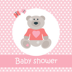 Baby shower card with bear and butterflies on pink background with polka dots