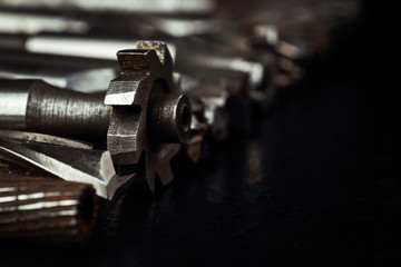 Metal mechanical parts on a black background.
