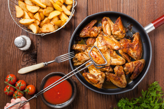 Baked wings, served with dip or baked potatoes.