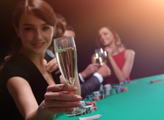 young beautiful woman playing in casino