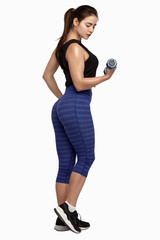 sport girl in leggings with dumbbells