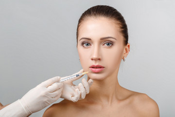 Naklejka premium woman getting cosmetic injection
