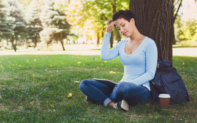 Fototapeta premium Attractive woman with tablet outdoors