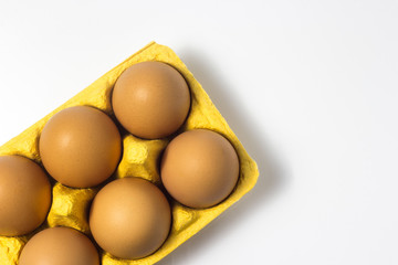 Eggs in a package on a white background