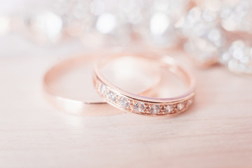 Wedding wedding rings on a light background, selective focus, macro