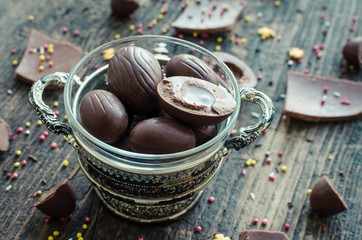 Easter composition with chocolate eggs