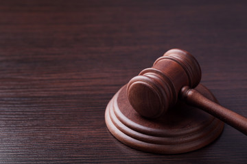 Judge gavel on wooden table