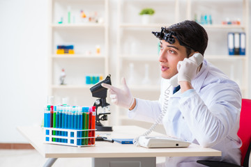 Young chemical scientist working in lab