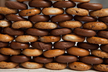 Tasty bagels. Fresh bagels on rustic wooden background.