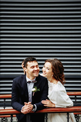 Sensual wedding Couple, groom and bride, holds each other and laughing