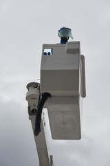 An electrician on aerial platform