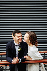 Sensual wedding Couple, groom and bride, holds each other and laughing