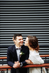 Sensual wedding Couple, groom and bride, holds each other and laughing