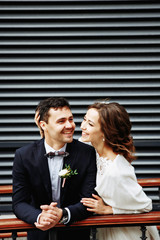 Sensual wedding Couple, groom and bride, holds each other and laughing