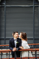 Sensual wedding Couple, groom and bride, holds each other and laughing