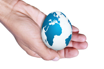 Easter egg in hand / Easter egg with drawing of the card of the planet Land in hand of the person