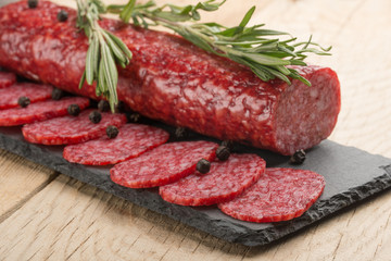 Sausage with salami with rosemary. Macro