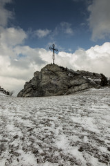 Fototapeta premium A hill called Maly Giewont with a characteristic cross in Olsztyn near Czestochowad