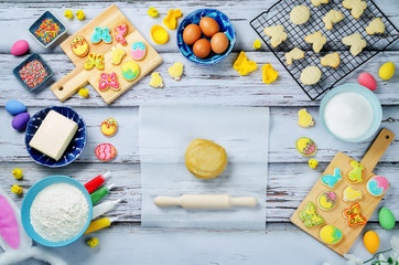 Sugar dough Easter cookies and ingredients for baking