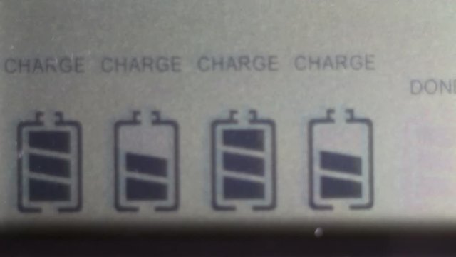 Charging the batteries, charger screen, closeup.

