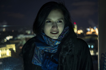 night city light young girl speaking