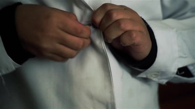 Kid Getting Dressed For School with White Apron. 