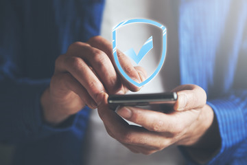 Businessman using smart phone  and digital padlock in screen