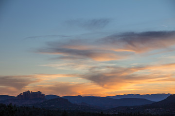 Last orange glow of daylight over Sedona's red rocks, Arizona