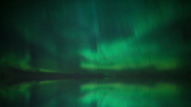 4k Aurora Borealis (Northern Lights) over the lake timelapse