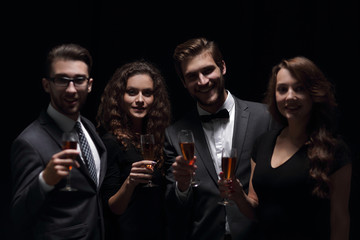 company fashionable friends ,with a glass of wine