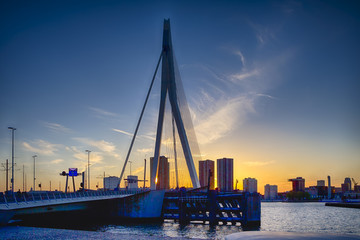 Fototapeta na wymiar Travel Concepts, Ideas and Destinations.Picturesque View of Erasmus Bridge in Rotterdan Before the Sunset.