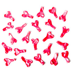 Fototapeta na wymiar red latex balloons in shape of heart on white background