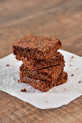 Brownie tower on wooden background