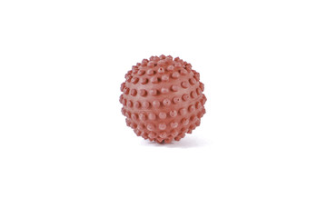 Red toy ball on white background