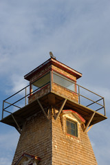 The square-tapered and shingled Cape Tryon Lighthouse on Prince Edward Island