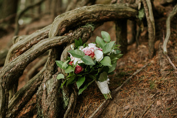 wedding bouquet under tree