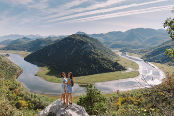 two girls travelling in mountains